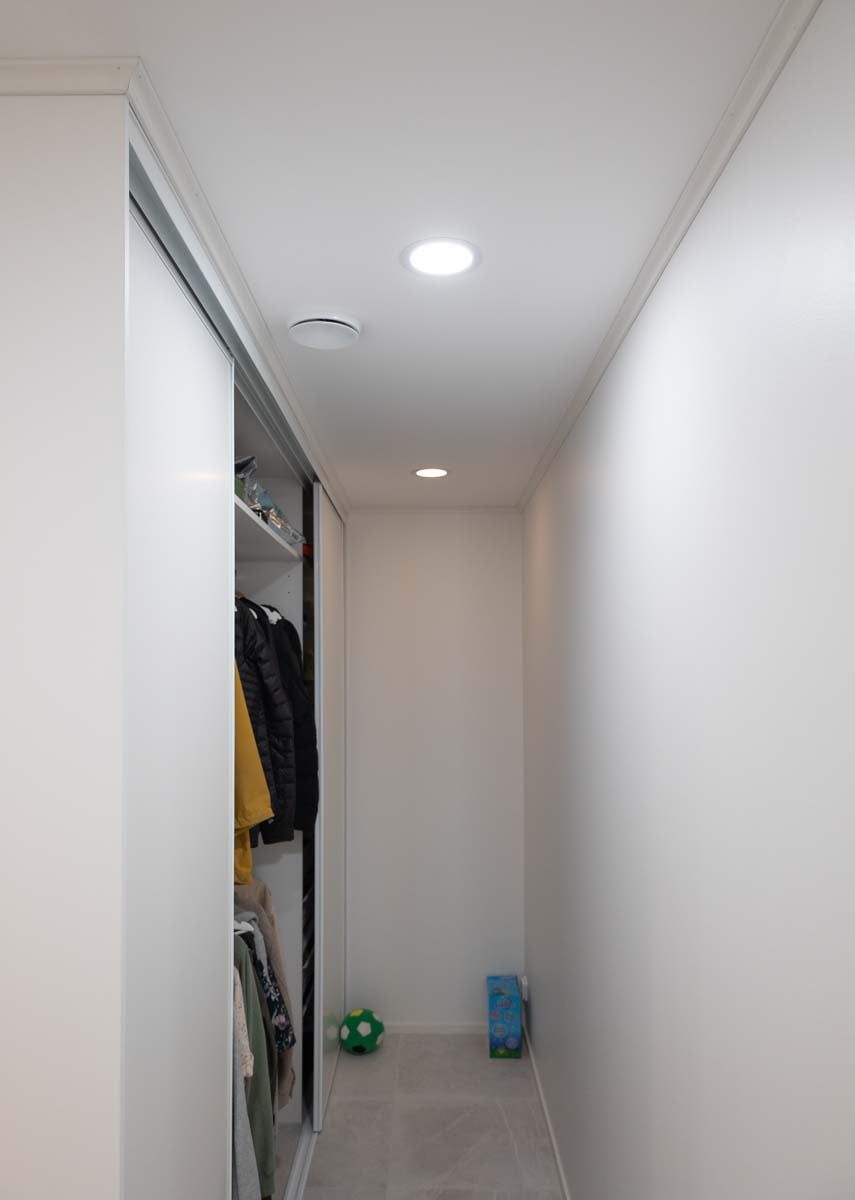 The wide-opening Plafons bring light into the narrow wardrobe space. LedStore.fi